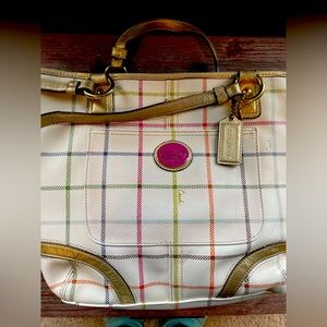 Coach purse with hot pink lining